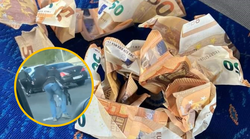 VIDEO: Bacao novčanice od 50 eura iz auta i izazvao prometni kolaps. Kakav samo grabež za  novcem koji je padao s neba