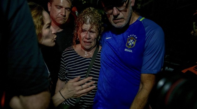 People gather in the aftermath of an Iranian attack in Tel Aviv, Israel, on June 13, 2025. The site was struck by an Iranian ballistic missile during Tehran’s retaliation for Israeli attacks on Iran’s nuclear and military facilities. Photo by Matan Golan/Middle East Images/ABACAPRESS.COM Photo: Middle East Images/ABACA/ABACA